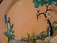 Mexican vintage pottery and ceramics, a wonderful charger from Tlaquepaque, Jalisco, c. 1930's. Another closeup photo of the man climbing the tree with ax in hand.