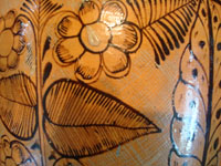 Mexican vintage pottery and ceramics, a beautiful vase with lovely floral designs, from Tlaquepaque, Jalisco, c. 1940's. Closeup photo of the floral designs on the Tlaquepaque pottery vase.