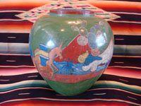 Mexican vintage pottery and ceramics, a beautiful burnished, green pottery olla with incredibly wonderful scenes, Tonala, Jalisco, c. 1930's. The scenes feature a campesino and his burro. Main photo of the entire olla or vase.