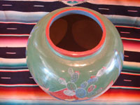 Mexican vintage pottery and ceramics, a beautiful burnished, green pottery olla with incredibly wonderful scenes, Tonala, Jalisco, c. 1930's. The scenes feature a campesino and his burro. Photo of the top of the olla, looking down on the mouth.