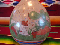 TT-3: Mexican vintage pottery and ceramics, a beautiful burnished jar from Tonala Jalisco, c. 1930's. Closeup photo of one side of the jar.
