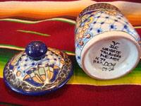 Mexican vintage pottery and ceramics, a beautiful lidded Talavera dish from Puebla, bearing the mark of the Uriarte fabrica, c. 1960's. View of the bottom of the Talavera bowl with the Uriarte mark.