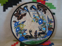 Mexican vintage pottery and ceramics, a very lovely pair of pottery plates with a fine petatillo cross-hatched background and very beautiful artwork, by Tomas Lucano, Tonala or San Pedro Tlaquepaque, Jalisco, c. 1930's.  Closeup photo of the front of one of the plates by Tomas Lucano.