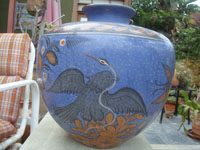 Mexican vintage pottery and ceramics, a stunning blue pottery urn with fabulous artwork and wonderfully burnished, Tonala, Jalisco, c. 1930. Main photo of the urn.