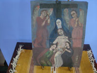 Mexican vintage devotional art, a retablo painted on tin showing Mother Mary, Mary Magdalen, an Apostle, and two angels taking the body of the Crucified Christ down from the Cross, c. 1940's. Main photo of the retablo.