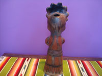 Mexican vintage folk art, a pottery statue of a shaman, possibly used for ceremonial purposes, Guerrero, c. 1940's. Photo of the back of the statue.