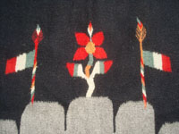 Vintage Mexican textiles and sarapes, a beautiful Oaxacan textile with naturally colored black and white wool, and with patriotic symbols of the Mexican flag, Oaxaca, c. 1940's.  Closeup photo of one of the decorative flags.