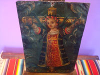 Mexican vintage devotional art, a retablo painted on tin depicting Santa Liberata on a cross, Mexico, c. 1940's. Main photo of the retablo.