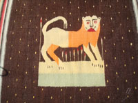 Mexican vintage textiles and sarapes, a beautiful textile featuring a wonderful lion. Mexico, c. 1930.  Closeup photo of the lion.