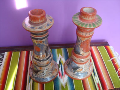 Mexican vintage pottery and ceramics, a pair of burnished pottery candleholders beautifully decorated with patterns of vines, Tonala Jalisco, c. 1950's.