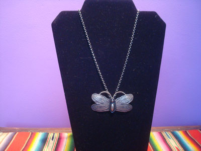 Native American Indian vintage sterling silver jewelry, and Navajo vintage sterling silver jewelry, a very beautiful Navajo silver butterfly pendant with very fine stamping on a wonderful silver chain, Arizona or New Mexico, c. 1960's.