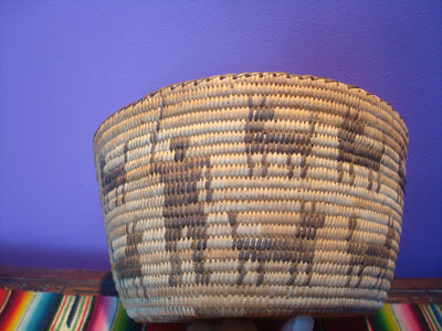 Native American Indian baskets, a beautiful Pima woven pictorial basket showing a man and 19 animals, Arizona, c. 1930's.