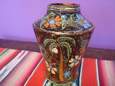 Mexican vintage pottery and ceramics, a beautiful blackware pottery vase with a starry night background and fantastic artwork, Tonala or San Pedro Tlaquepaque, Jalisco, c. 1930's. The artwork features wonderful floral designs. Photo of the second side of the vase.