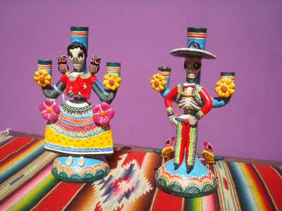 Mexican vintage folk art, a wonderful pair of pottery Day of the Dead candleholders by the famous late artist Alfonso Castillo, c. 1980.