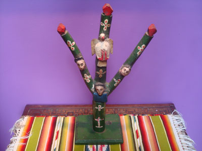 Mexican or Guatemalan vintage devotional art and folk art, a carved wooden tree-of-life with the faces of the Trinity on three arms and possibly Mary, the mother of Jesus at the base, below the Trinity, Guatemala or Mexico, c. 1940's.