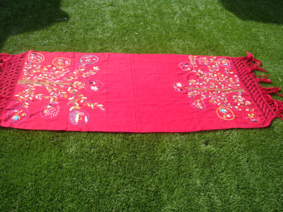 Mexican vintage testtiles and sarapes, a wonderful hand embroidered shawl from Patzcuaro, Michoacan, c. 1970's. The shawl is decorated at each end with a tree depicting scenes of life in Patzcuaro. Each rree has six differnt scenes.