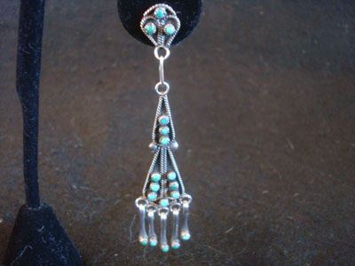 Native American Indian sterling silver jewelry, and Zuni sterling silver jewelry, a beautiful pair of chandelier-style sterling silver dangling earrings, Zuni Pueblo, New Mexico, c. 1940's. The earrings are extremely elegant, and the silverwork is exceptional.