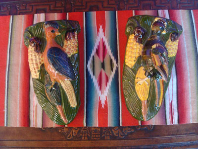 Mexican vintage pottery and ceramics, a beautiful pair of pottery wall-sconces with wonderful glazing and featuring a bird on each sconce eyeing delicious corn, San Pedro Tlaquepaque, c. 1940's.
