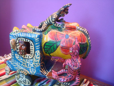 Mexican vintage folk art, a wonderful pottery water truck supervised by playful devils, Ocumicho, Michoacan, c. 1950's. Playful devils are very typical of pottery folk art from Ocumicho. 