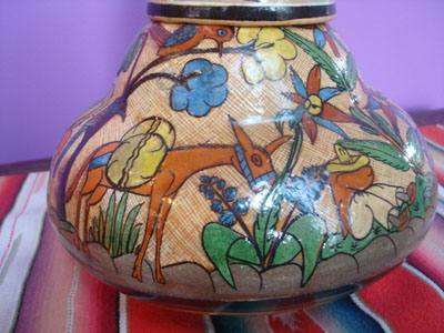 Mexican vintage pottery and ceramics, a pottery water bottle and cup with incredi bly fine artwork, Tonala or San Pedro Tlaquepaque, c. 1930's. A closeup photo of some of the artwork on the jar.