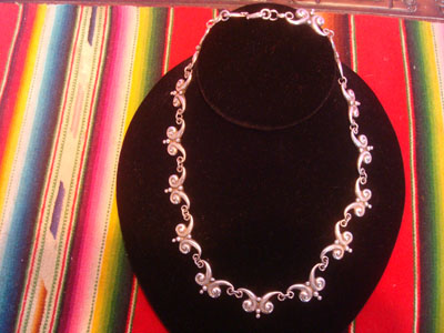Mexican vintage sterling silver jewelry, and Taxco vintage sterling silver jewelry, a beautiful sterling silver necklace by the famous silvermaker Victoria, Taxco, c. 1940's.