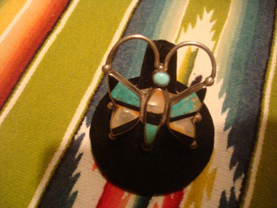 Native American Indian sterling silver jewelry, and Zuni sterling silver jewelry, a beautiful Zuni silver ring with turquoise, jet, spiny oyster, in the shape of a lovely butterfly, Zuni Pueblo, New Mexico, c. 1940's.