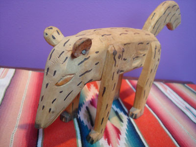 Mexican vintage folk art, a carved wooden animalito with wonderful shape and decorations, attributed to the great Manuel Jimenez of Arrazola, Oaxaca, c. 1950's.