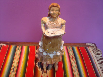 Mexican vintage folk art and pottery, a lovely sculpture of a woman vendor of tamales, Michoacan, c. 1940's.