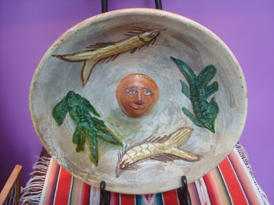Mexican pottery and ceramics, a lovely pottery charger by the famous potter Dolores Parras, c. 1970's.