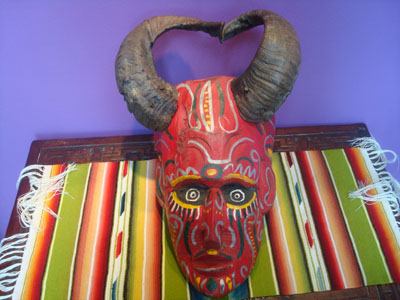 Mexican vintage woodcarvings and masks, a wonderful wooden mask depicting a devil and used in ceremonial dances, Guerrero, c. 1940's.