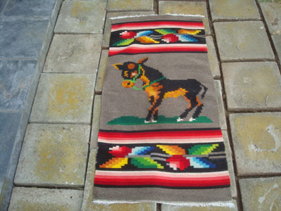 Mexican vintage sarapes and textiles, a lovely Oaxacan woolen textile featuring a wonderful donkey, Oaxaca, c. 1950's.