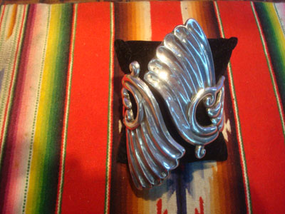 Mexican vintage sterling silver jewelry, and Taxco vintage sterling silver jewelry, a beautiful clamp silver bracelet with fine silverwork and a beautiful design, Taxco, c. 1940's.