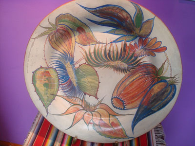 Mexican vintage pottery and ceramics, a lovely pottery charger with graceful floral decorations, Tonala, c. 1930's.