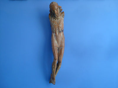 Mexican vintage devotional art, a carved wooden figure depicting the corpus of Christ, c. mid-19th century.