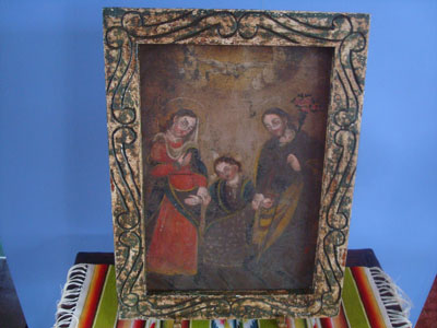 Mexican vintage devotional art, a beautiful retablo painted on tin, depicting the Holy Family, c. 19th century.