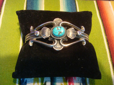 Native American Indian silver jewelry, and Navajo vintage silver jewelry, a stunning Navajo silver bracelet with a wonderful turquoise stone, Arizona or New Mexico, c. 1950's.