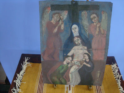 Mexican vintage devotional art, a retablo painted on tin showing Mother Mary, Mary Magdalen, an Apostle, and two angels taking the body of the Crucified Christ down from the cross, c. 1940's.