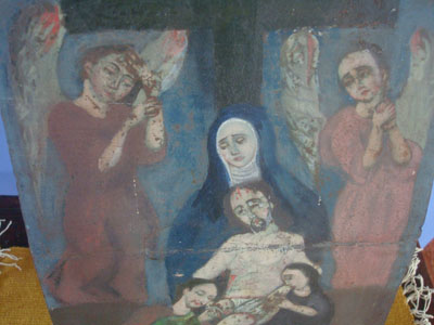 Mexican vintage devotional art, a retablo painted on tin showing Mother Mary, Mary Magdalen, an Apostle, and two angels taking the body of the Crucified Christ down from the Cross, c. 1940's. The artwork is very graceful and fine.