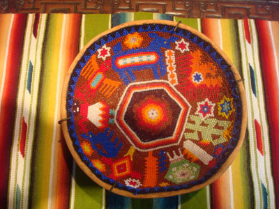 Mexican vintage folk art, a Huichol beaded gourd with very fine and intricate decorations in the beadwork, Jalisco or Nayarit, c. 1980's.