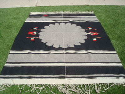 Vintage Mexican textiles and sarapes, a beautiful Oaxacan textile with naturally colored black and white yarn, and with patriotic symbols of the Mexican flag, Oaxaca, c. 1940's.