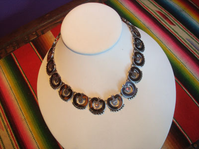 Mexican vintage sterling silver jewelry, and Taxco vintage sterling silver jewelry, a beautiful necklace with silver, tortoise shell and abalone, Taxco, c. 1940's.